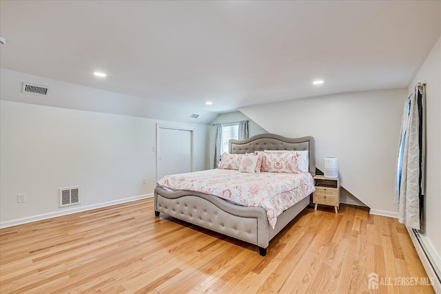 5 Alvin Ct, Menlo Park Terrace, NJ 08840 - bedroom with baseboard heating, vaulted ceiling, light wood-type flooring, and recessed lighting