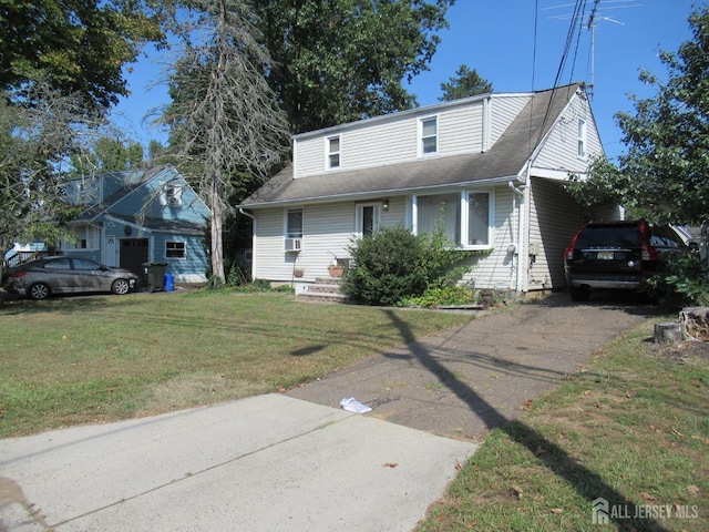 view of front of property with a front lawn