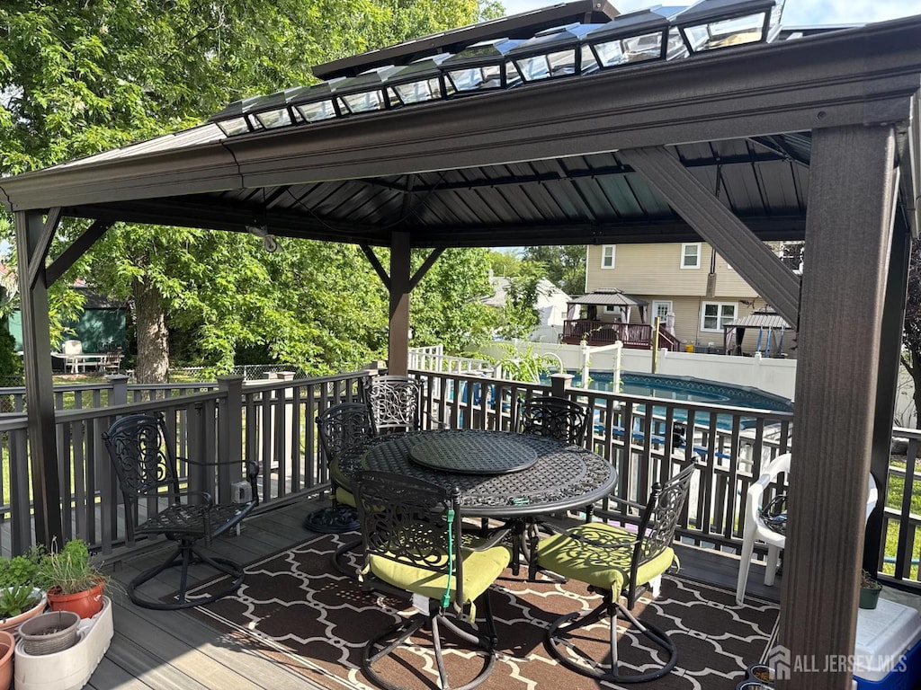38 Victory Pl E, Brunswick, NJ 08816 - deck featuring a gazebo and outdoor dining area