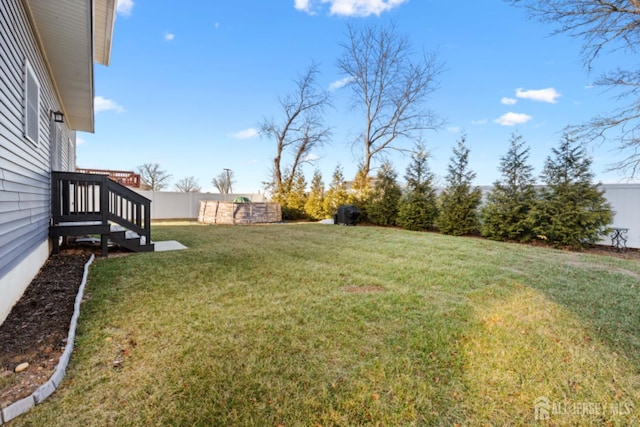 view of yard featuring fence