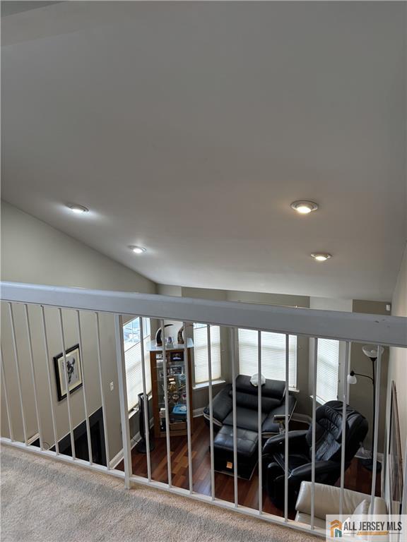 details with recessed lighting and carpet