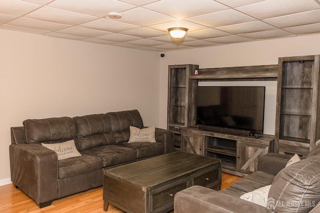 121 Sharon Garden Ct, Woodbridge Proper, NJ 07095 - living area with light wood finished floors and a drop ceiling
