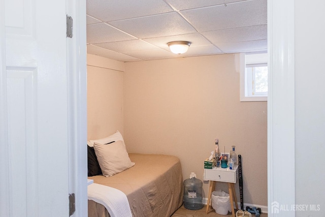 bedroom featuring a drop ceiling
