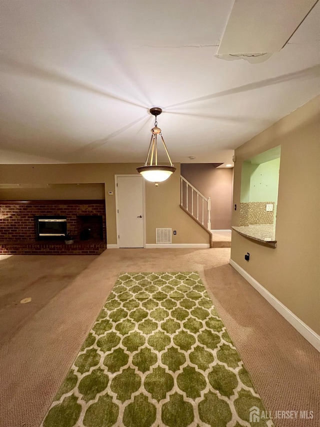 37 Albury Way N, Brunswick, NJ 08902 - interior space with carpet, stairs, and a brick fireplace