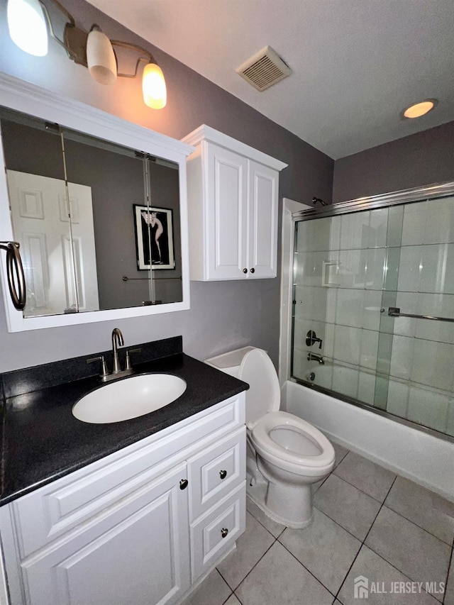 37 Albury Way N, Brunswick, NJ 08902 - bathroom featuring vanity, tile patterned floors, and combined bath / shower with glass door