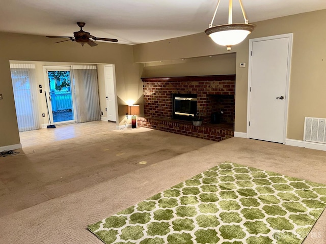 37 Albury Way N, Brunswick, NJ 08902 - unfurnished living room with carpet flooring, a ceiling fan, and a fireplace