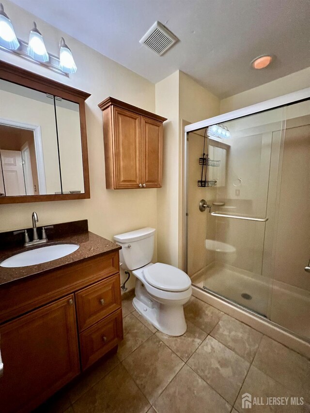 37 Albury Way N, Brunswick, NJ 08902 - bathroom with vanity, a shower stall, and tile patterned floors