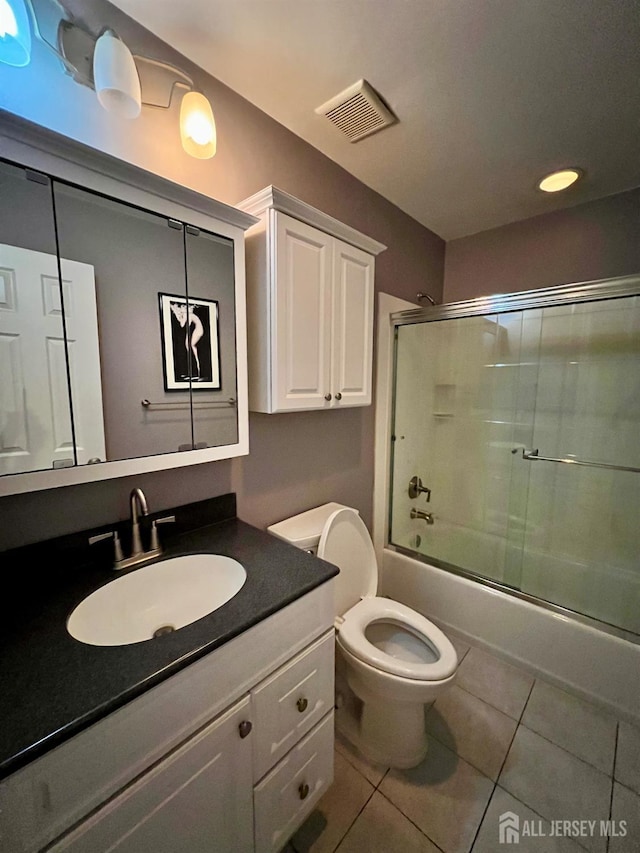 37 Albury Way N, Brunswick, NJ 08902 - bathroom featuring vanity, tile patterned flooring, and shower / bath combination with glass door