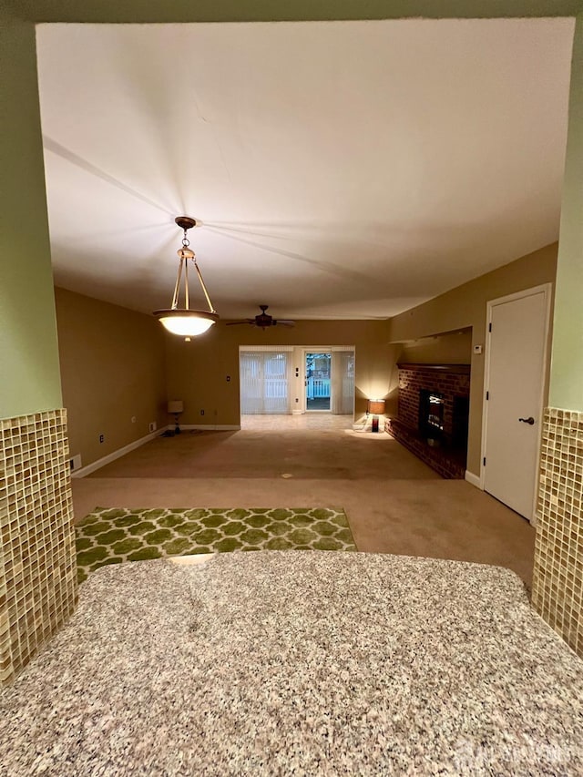 37 Albury Way N, Brunswick, NJ 08902 - unfurnished living room with a fireplace, carpet flooring, and ceiling fan