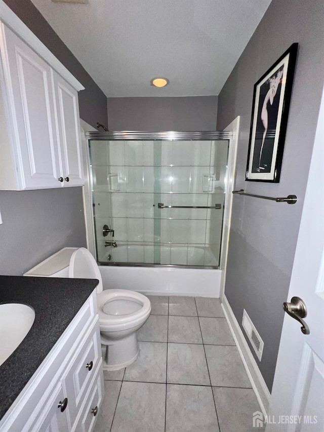 37 Albury Way N, Brunswick, NJ 08902 - full bathroom with vanity, enclosed tub / shower combo, and tile patterned floors