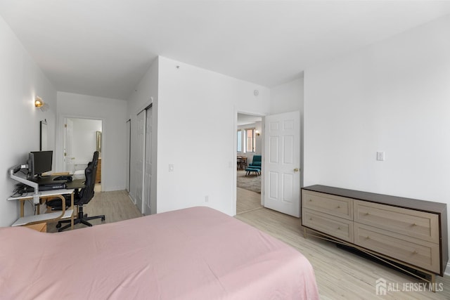 bedroom with light wood-type flooring