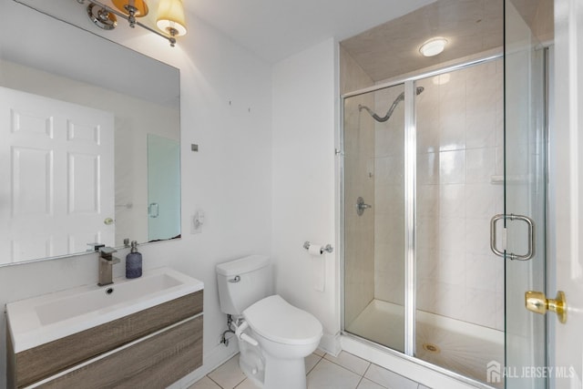 bathroom featuring toilet, a shower stall, and tile patterned floors