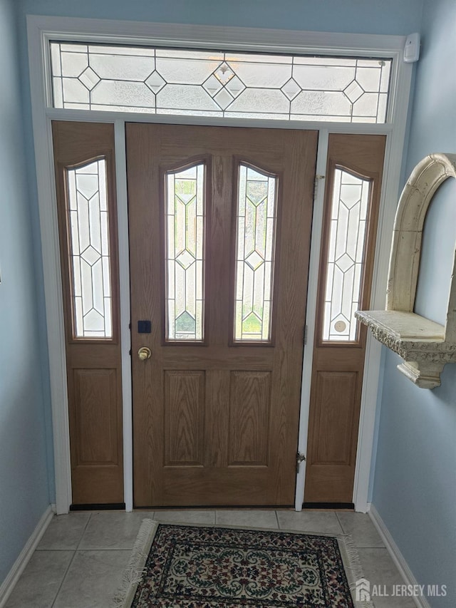 16 Phillip Ct, Monroe, NJ 08831 - entryway featuring baseboards and light tile patterned flooring