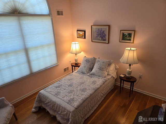16 Phillip Ct, Monroe, NJ 08831 - bedroom with wood finished floors, baseboards, and multiple windows