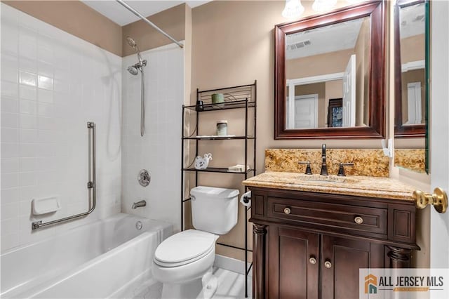 full bath featuring toilet, vanity, visible vents, and shower / bathtub combination