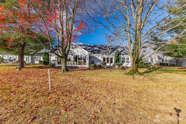 view of front of house with a front lawn