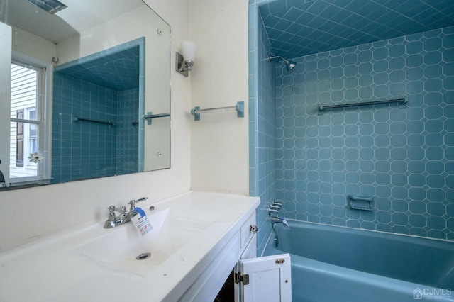 bathroom featuring vanity and shower / bathtub combination