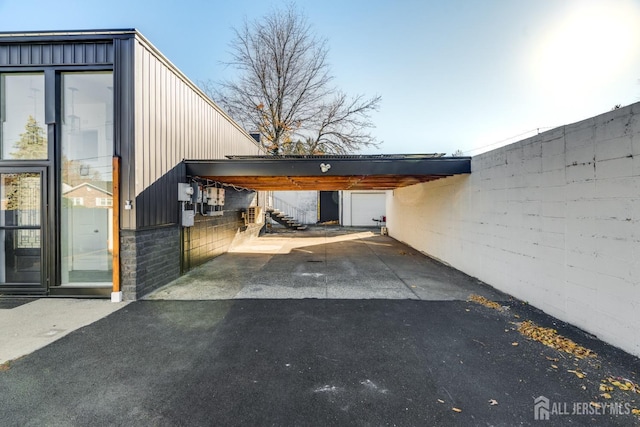 view of car parking with a carport