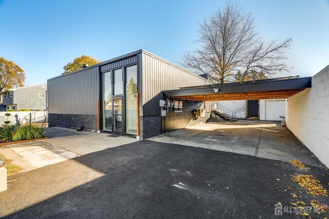 exterior space with a carport