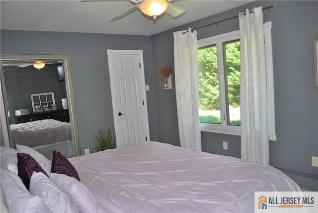 bedroom featuring ceiling fan