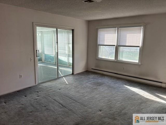 unfurnished room featuring a textured ceiling, carpet floors, and a baseboard radiator