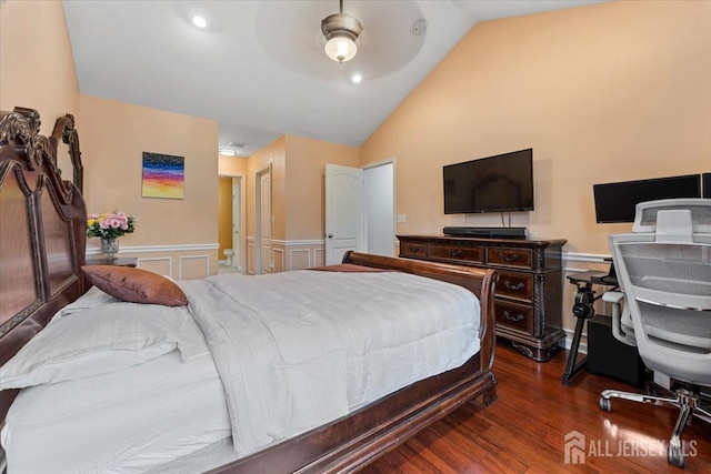 2420 Canterbury Ln, North Brunswick, NJ 08902 - bedroom with a wainscoted wall, vaulted ceiling, wood finished floors, a decorative wall, and a ceiling fan
