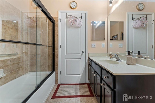 2420 Canterbury Ln, North Brunswick, NJ 08902 - bathroom with vanity and shower / bath combination with glass door