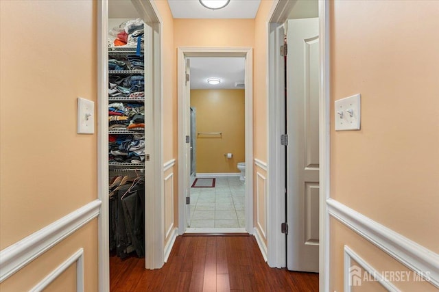2420 Canterbury Ln, North Brunswick, NJ 08902 - corridor featuring dark wood-type flooring