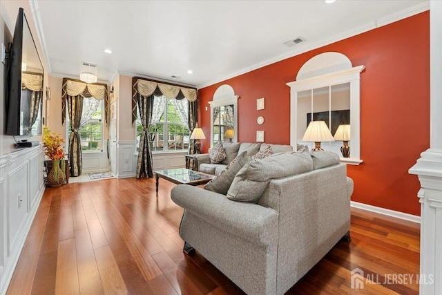 2420 Canterbury Ln, North Brunswick, NJ 08902 - living room with hardwood / wood-style flooring, crown molding, recessed lighting, and ornate columns