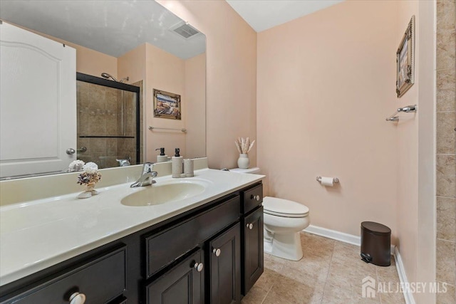 2420 Canterbury Ln, North Brunswick, NJ 08902 - bathroom with vanity, toilet, tile patterned flooring, tiled shower, and baseboards