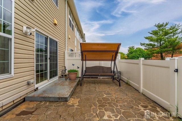 2420 Canterbury Ln, North Brunswick, NJ 08902 - fenced backyard with a patio area