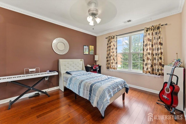 2420 Canterbury Ln, North Brunswick, NJ 08902 - bedroom featuring baseboards, hardwood / wood-style floors, crown molding, and ceiling fan