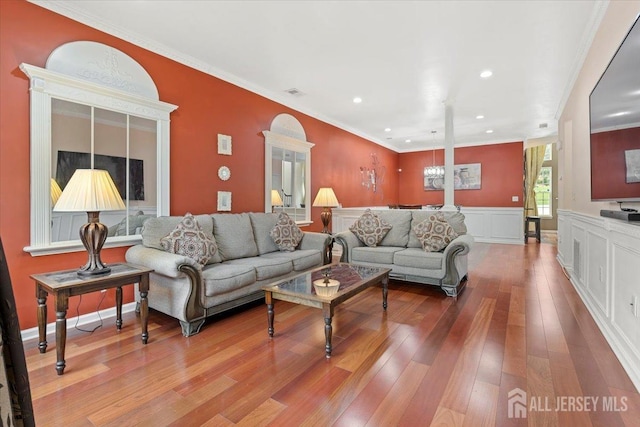 2420 Canterbury Ln, North Brunswick, NJ 08902 - living area featuring hardwood / wood-style flooring, wainscoting, crown molding, and recessed lighting