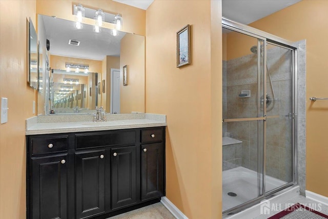 2420 Canterbury Ln, North Brunswick, NJ 08902 - full bathroom with a stall shower, baseboards, vanity, and tile patterned flooring
