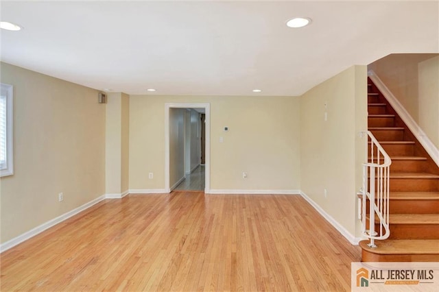 27 Laurel St, South Amboy, NJ 08879 - spare room featuring stairs, wood finished floors, and recessed lighting