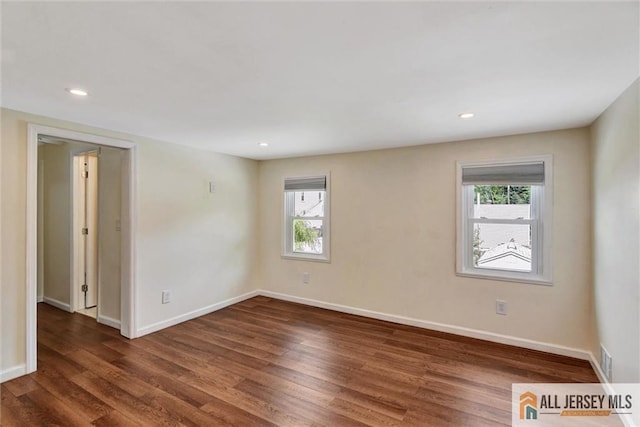27 Laurel St, South Amboy, NJ 08879 - spare room featuring wood finished floors and recessed lighting