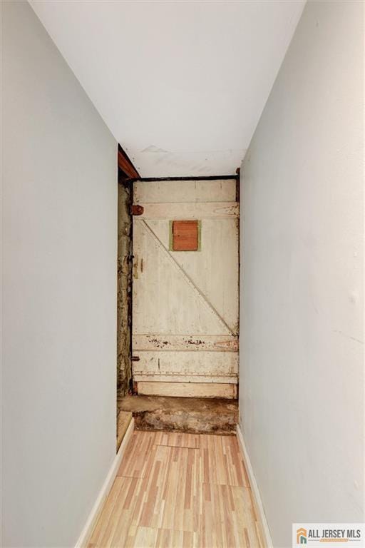 27 Laurel St, South Amboy, NJ 08879 - hallway featuring wood finished floors