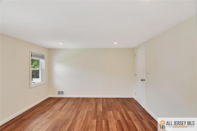 27 Laurel St, South Amboy, NJ 08879 - empty room featuring wood finished floors and recessed lighting