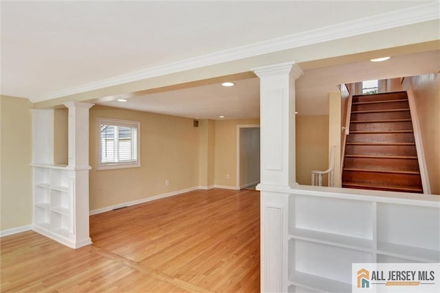 27 Laurel St, South Amboy, NJ 08879 - below grade area featuring light wood-style floors, stairway, recessed lighting, and crown molding