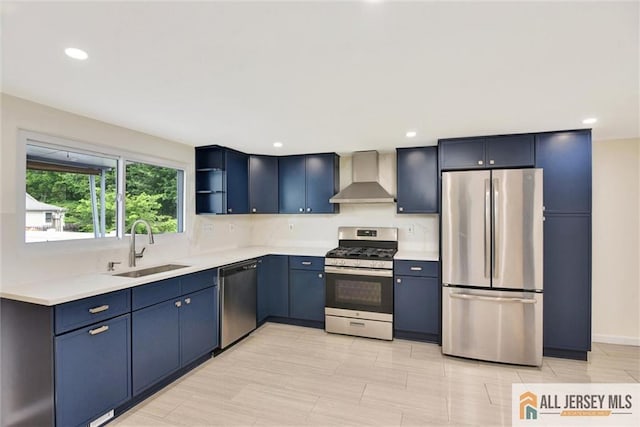 27 Laurel St, South Amboy, NJ 08879 - kitchen with stainless steel appliances, wall chimney range hood, light countertops, open shelves, and blue cabinetry