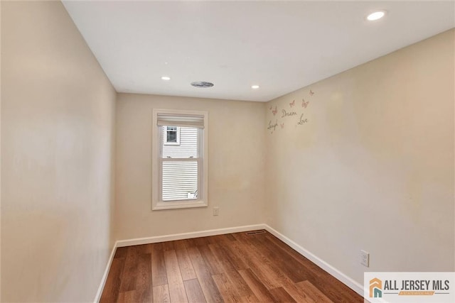 27 Laurel St, South Amboy, NJ 08879 - empty room with wood finished floors and recessed lighting
