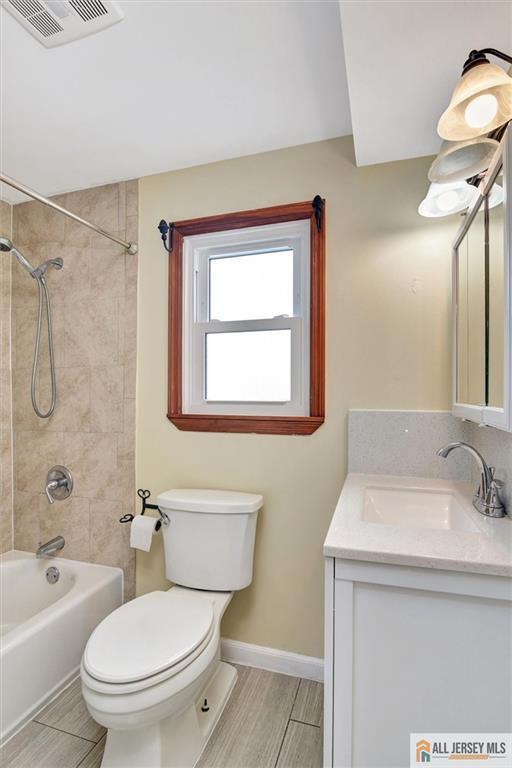 27 Laurel St, South Amboy, NJ 08879 - full bathroom with vanity and shower / bath combination