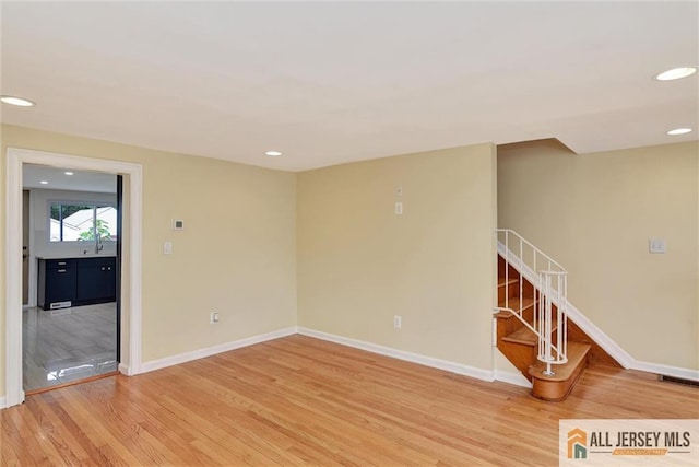 27 Laurel St, South Amboy, NJ 08879 - unfurnished room featuring light wood-style floors, recessed lighting, and stairs