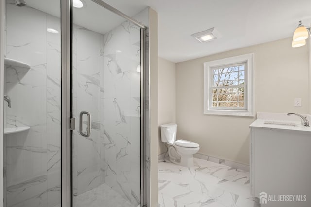 full bath with marble finish floor, vanity, a marble finish shower, and toilet