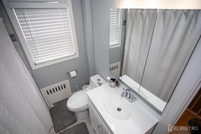 719 Charles St, South Amboy, NJ 08879 - bathroom with radiator and vanity