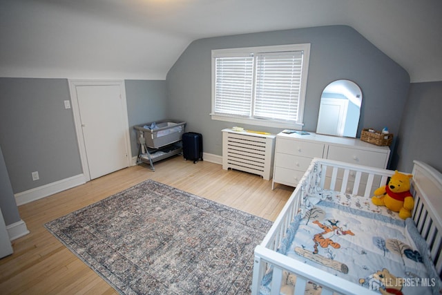 719 Charles St, South Amboy, NJ 08879 - bedroom featuring light wood-style flooring and vaulted ceiling