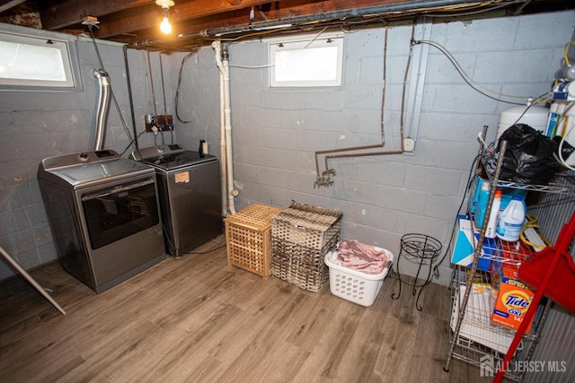 719 Charles St, South Amboy, NJ 08879 - basement with washer and dryer and light wood-style floors