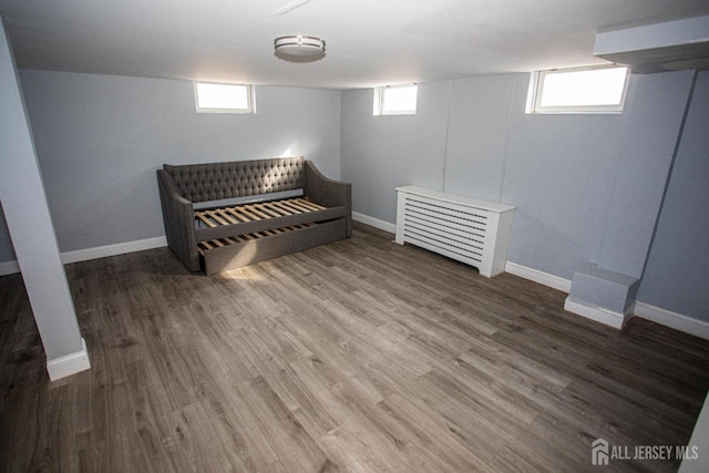 719 Charles St, South Amboy, NJ 08879 - below grade area with wood finished floors and healthy amount of natural light