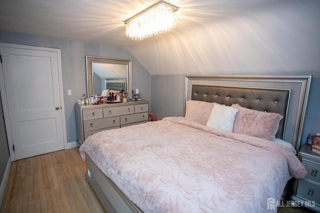 719 Charles St, South Amboy, NJ 08879 - bedroom featuring wood finished floors and vaulted ceiling