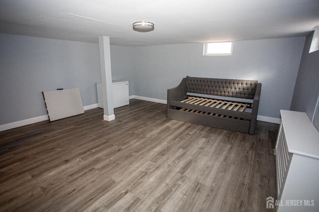 719 Charles St, South Amboy, NJ 08879 - below grade area featuring wood finished floors and baseboards